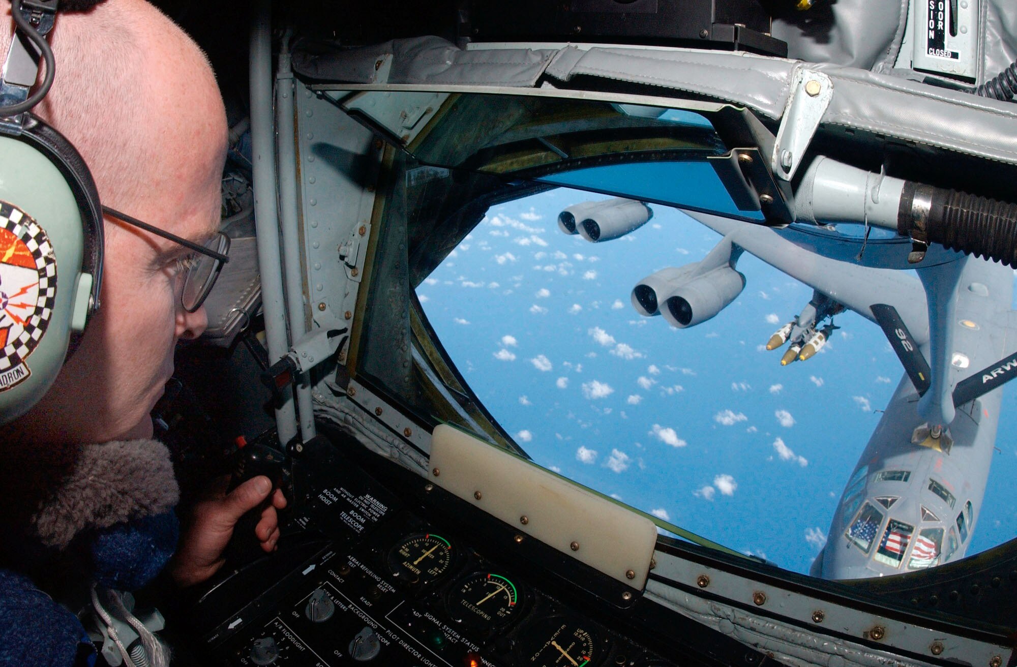 OPERATION ENDURING FREEDOM -- Staff Sgt. Bob Spychalski, a KC-135 Stratotanker boom operator, 28th Expeditionary Air Refueling Squadron, prepares to refuel a B-52 Stratofortress on its way to Afghanistan, May 7, 2003. (U.S. Air Force photo by Tech. Sgt. Richard Freeland)