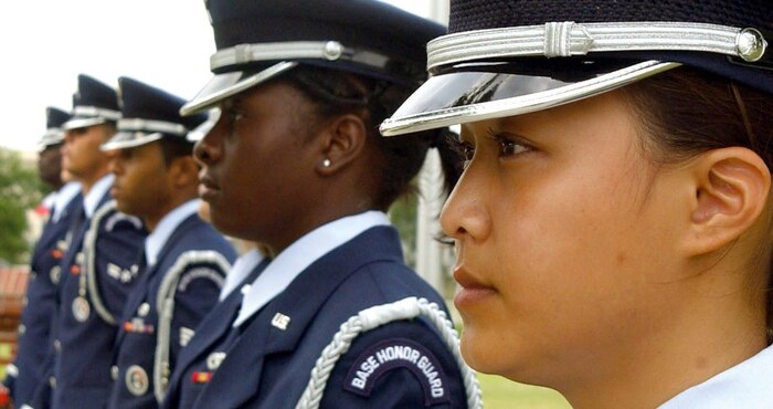CHARLESTON AIR FORCE BASE, S.C. -- The Charleston AFB Honor Guard paid tribute to fallen members of the 437th Security Forces Squadron and the Air Force Office of Special Investigations during a retreat ceremony May 16.  A bell chimed 87 times, remembering 84 Air Force Security Forces members and three Air Force AFOSI agents who lost their lives in the line of duty since 1965.  (U.S. Air Force photo by Airman 1st Class Jason Bailey)