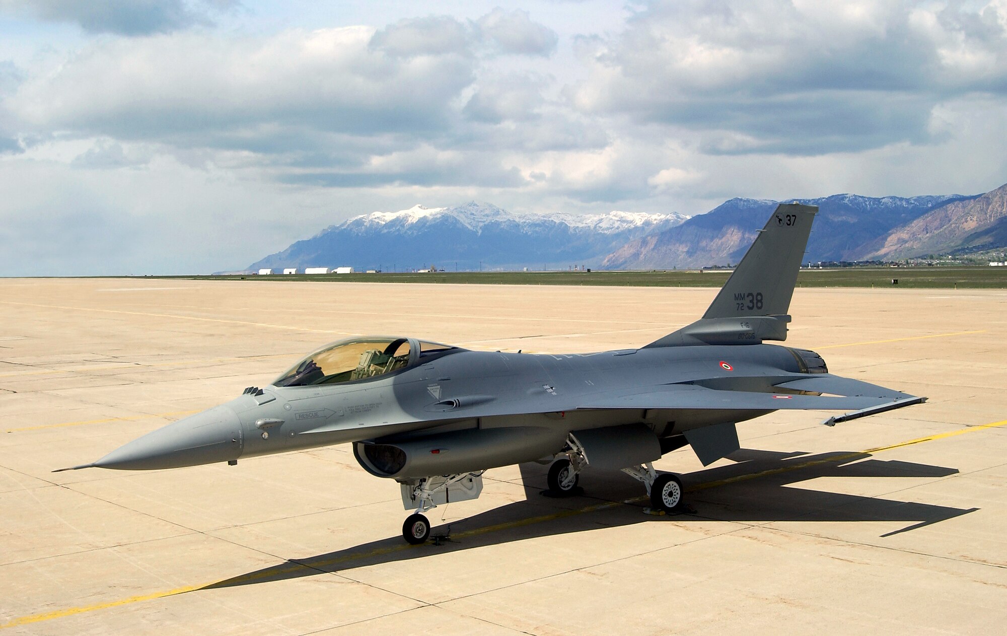 HILL AIR FORCE BASE, Utah (AFPN) -- Italian defense officials accepted the first of 34 modified and refurbished F-16 Fighting Falcon A and B models from Ogden Air Logistics Center experts here May 16.  (U.S. Air Force photo by Todd Cromar)