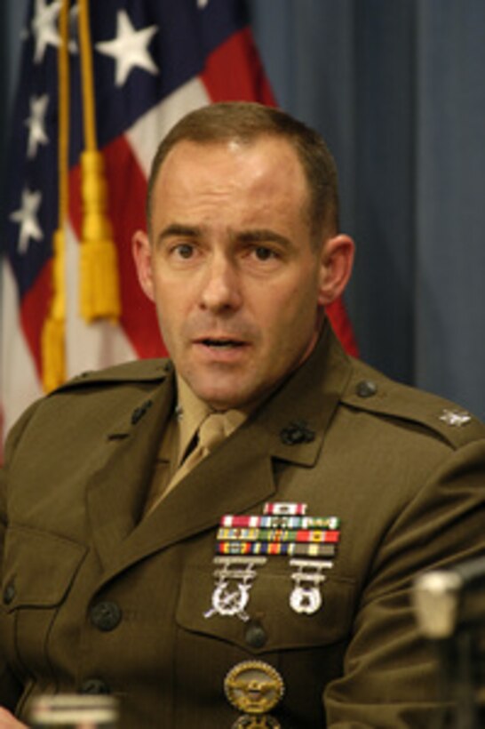 Marine Lt. Col. William Lietzau participates in a press briefing at the Pentagon on May 22, 2003, dealing with military commissions. In November 2001, President George W. Bush decided that enemy combatants taken into custody by the armed forces of the United States and charged as terrorists may be tried by military commissions. The President has not designated anyone stand trial by military commission, but it is deemed prudent to establish the framework for such a body should the need arise. Lietzau, currently a special advisor to the general counsel of the Department of Defense, served as the first acting chief prosecutor for military commissions until being replaced today by Col. Frederic Borch. 
