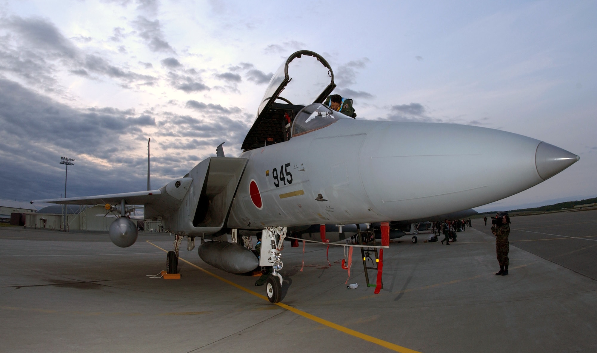 ELMENDORF AIR FORCE BASE, Alaska -- A Japanese air self defense force F-15J fighter sits under the Alaskan sunset after its historic arrival for Cooperative Cope Thunder on May 27.  The exercise, set for June 5 to 20, represents the first time the Japanese have deployed fighter aircraft onto North American soil for an exercise.  (U.S. Air Force photo by Tech. Sgt. Keith Brown)