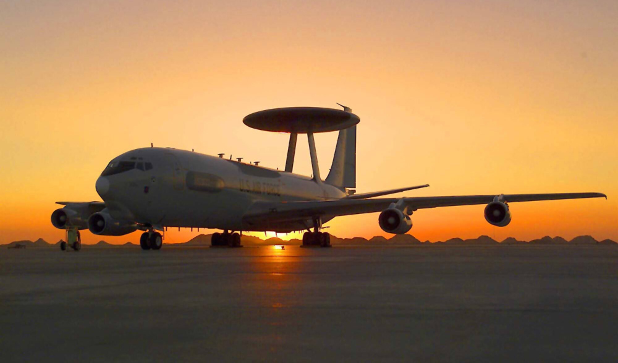 FILE PHOTO -- An E-3 Sentry Airborne Warning and Control System sits on the flightline at a forward-deployed location in Southwest Asia.  The AWACS mission conducted by the 363rd Expeditionary Airborne Air Control Squadron ended May 28 after 13 years.  (Courtesy photo)