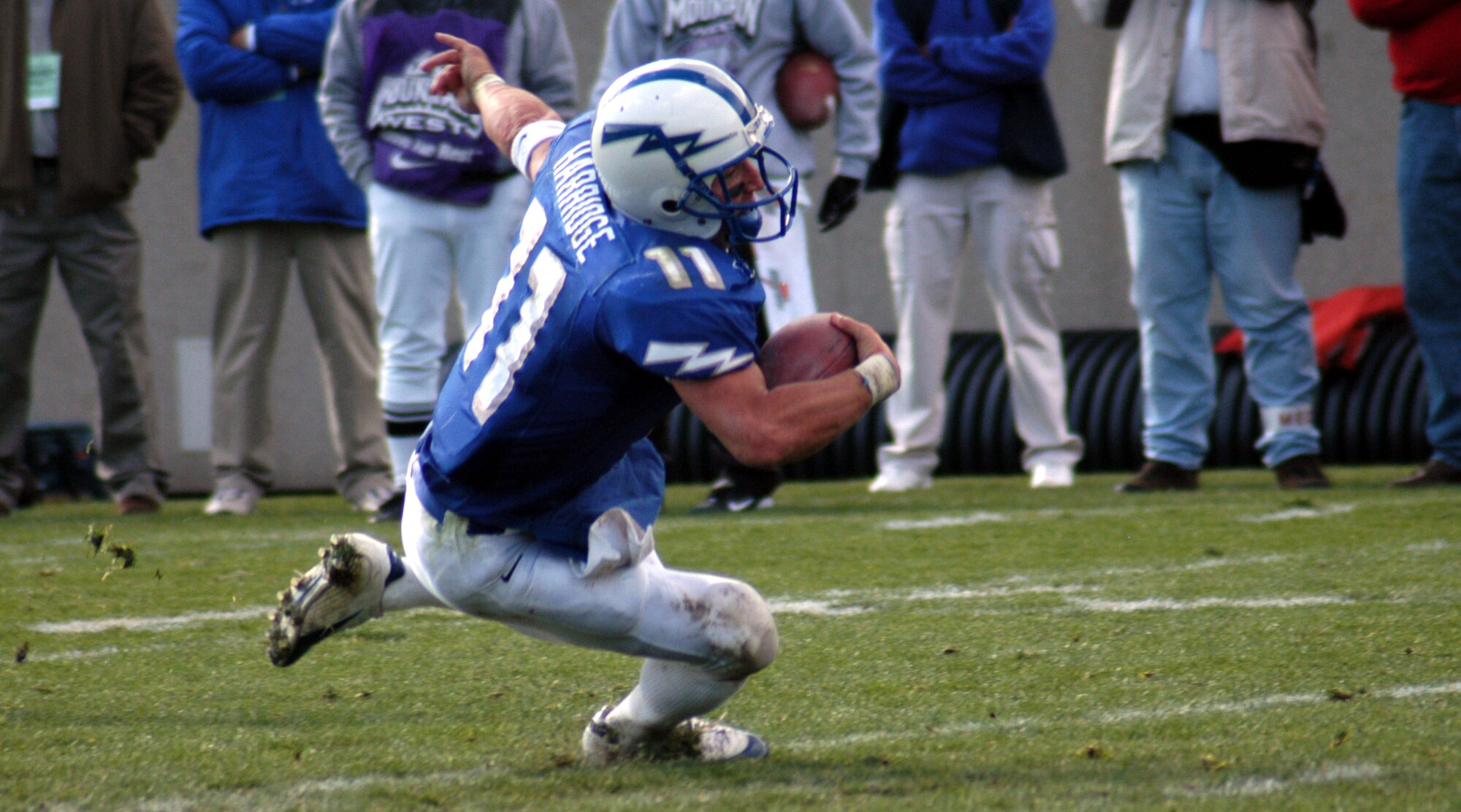 U.S. AIR FORCE ACADEMY, Colo. -- Falcons quarterback Chance Harridge slips during the two-point conversion attempt in triple overtime of the Mountain West conference first place battle against the University of Utah on Nov. 1.  Utah scored a touchdown and converted on a two-point conversion to win 45-43.  (U.S. Air Force photo by Airman 1st Class Mike Meares)