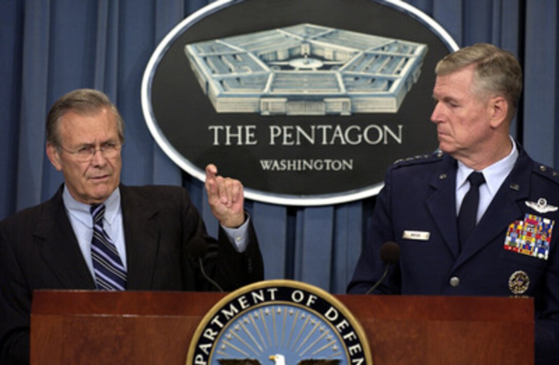 Secretary of Defense Donald H. Rumsfeld tells reporters about the plans for the rotation of forces in support of Operations Enduring Freedom and Iraqi Freedom during a Pentagon press briefing on Nov. 6, 2003. Rumsfeld and Chairman of the Joint Chiefs of Staff Gen. Richard B. Myers, U.S. Air Force, announced the force rotation, which will include approximately 85,000 active duty and 43,000 reservists from all services. 