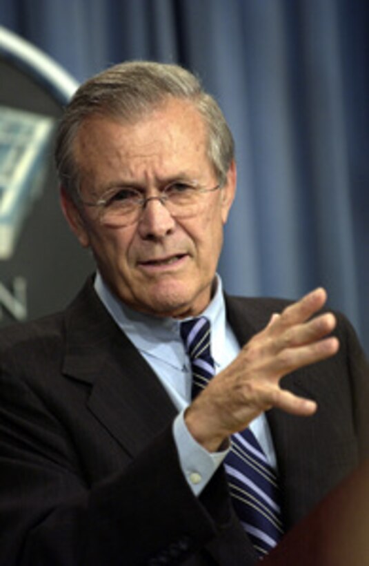 Secretary of Defense Donald H. Rumsfeld tells reporters about the plans for the rotation of forces in support of Operations Enduring Freedom and Iraqi Freedom during a Pentagon press briefing on Nov. 6, 2003. Rumsfeld and Chairman of the Joint Chiefs of Staff Gen. Richard B. Myers, U.S. Air Force, announced the force rotation, which will include approximately 85,000 active duty and 43,000 reservists from all services. 