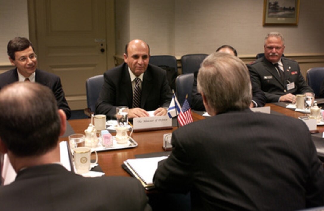 Israeli Minister of Defense Shaul Mofaz meets with Secretary of Defense Donald H. Rumsfeld in the Pentagon on Nov. 10, 2003. The two defense leaders are meeting to discuss national and international security concerns. 