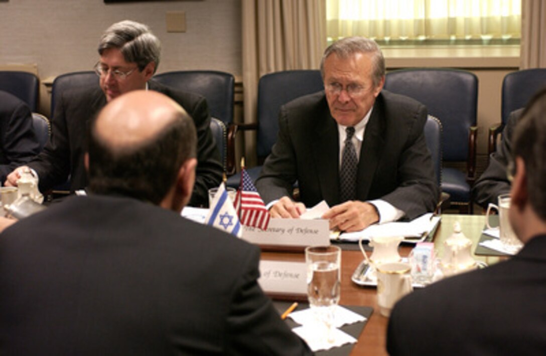 Secretary of Defense Donald H. Rumsfeld meets with Israeli Minister of Defense Shaul Mofaz in the Pentagon on Nov. 10, 2003. The two defense leaders are meeting to discuss national and international security concerns. 