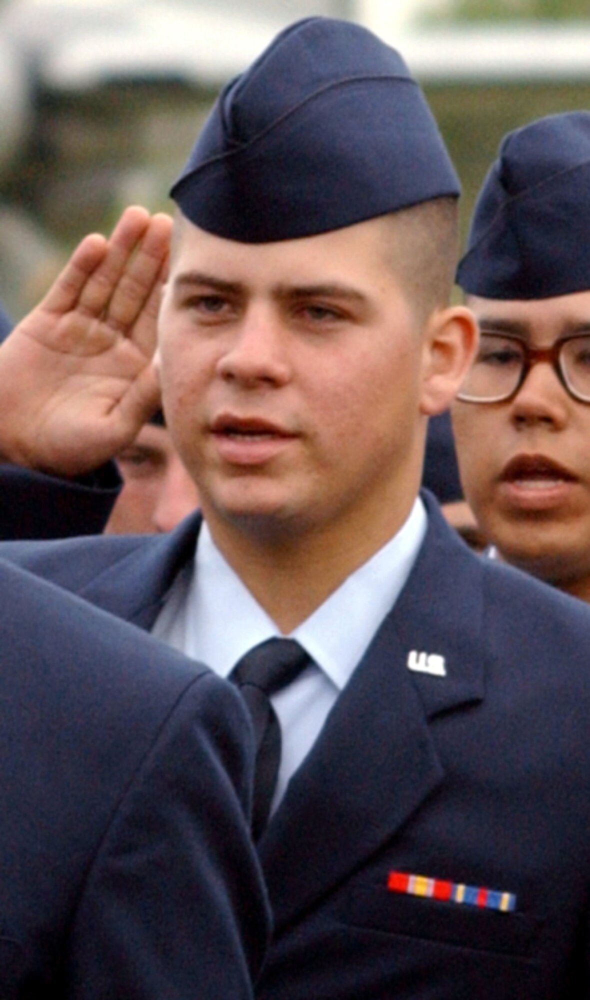 LACKLAND AIR FORCE BASE, Texas -- Airman Hector Barreto graduates from Basic Military Training here Nov. 14.  Barreto was the first person to enlist in the Air Force under the National Call to Service 15-month enlistment.  (U.S. Air Force photo by Alan Boedeker)