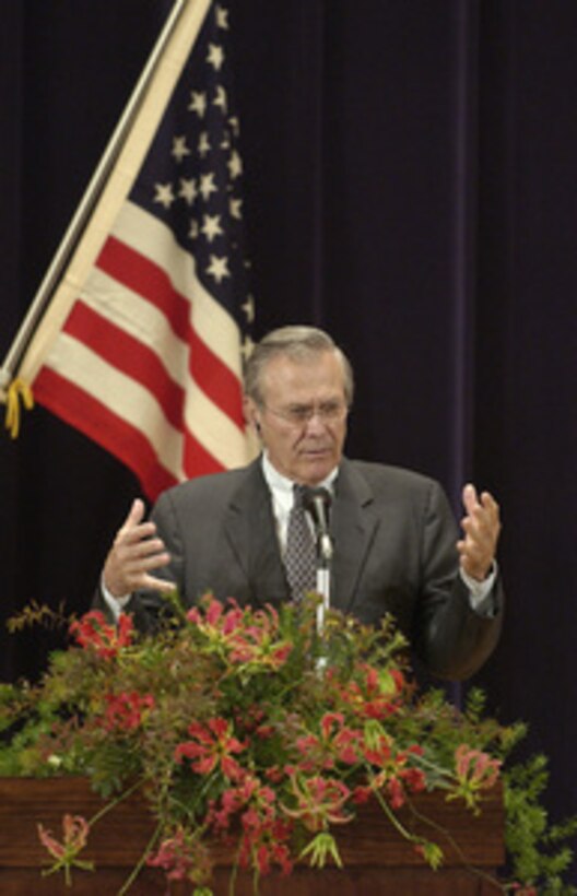 Secretary of Defense Donald H. Rumsfeld answers a reporter's question during a joint press conference with Minister of State for Defense Shigeru Ishiba at the Japan Defense Agency in Tokyo on Nov. 15, 2003. Rumsfeld is traveling to Guam, Japan and South Korea to meet with U.S. military forces and the local military and civilian leadership. 