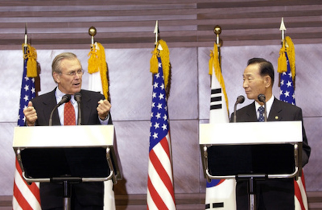 Secretary of Defense Donald H. Rumsfeld (left) responds to a reporter's question during a press conference with South Korean Minister of National Defense Cho Yong-kil at the National War Museum in Seoul, South Korea, on Nov. 17, 2003. Rumsfeld and Cho briefed reporters on their earlier talks in the annual Security Consultative Meeting. Rumsfeld is traveling to Guam, Japan and South Korea to meet with U.S. military forces and the local military and civilian leadership. 