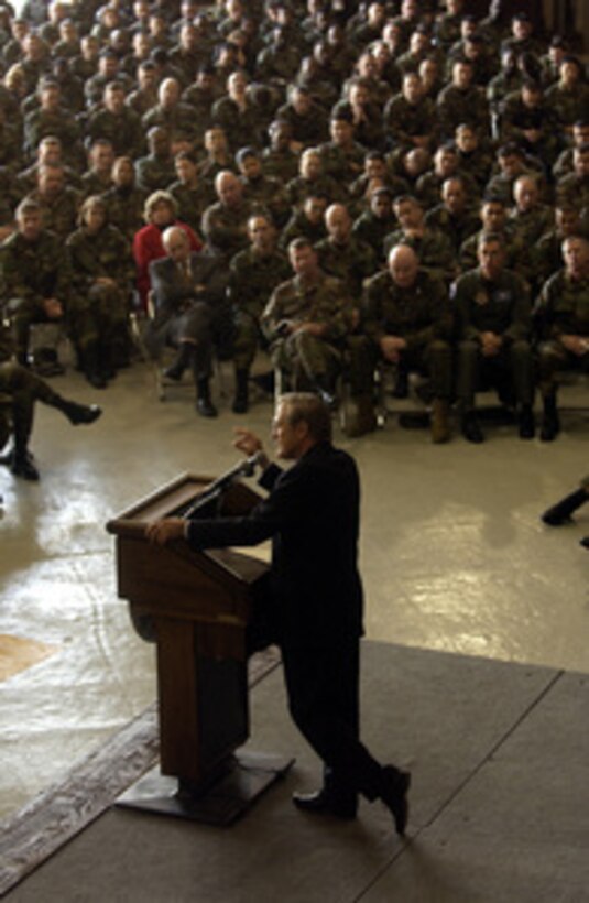 Secretary of Defense Donald H. Rumsfeld conducts a town hall meeting with U.S. troops at Osan Air Base, South Korea, on Nov. 18, 2003. Rumsfeld is traveling to Guam, Japan, and South Korea to meet with U.S. military forces and the local military and civilian leadership. 