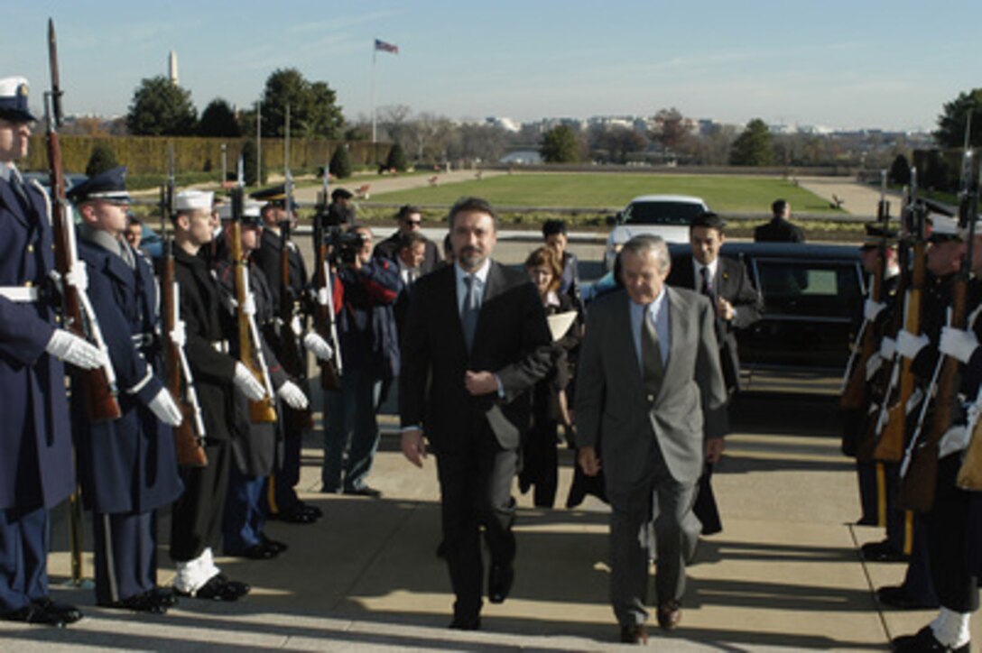 Secretary of Defense Donald H. Rumsfeld escorts Prime Minister Branko Crvenkovski of the Former Yugoslav Republic of Macedonia into the Pentagon on Nov. 25, 2003. 