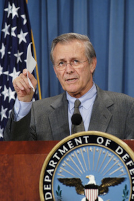 Secretary of Defense Donald H. Rumsfeld responds to a reporter's question during a press briefing with Chairman of the Joint Chiefs of Staff Gen. Richard B. Myers, U.S. Air Force, in the Pentagon on Nov. 25, 2003. Rumsfeld and Myers gave opening statements then fielded a broad range of questions from reporters. 