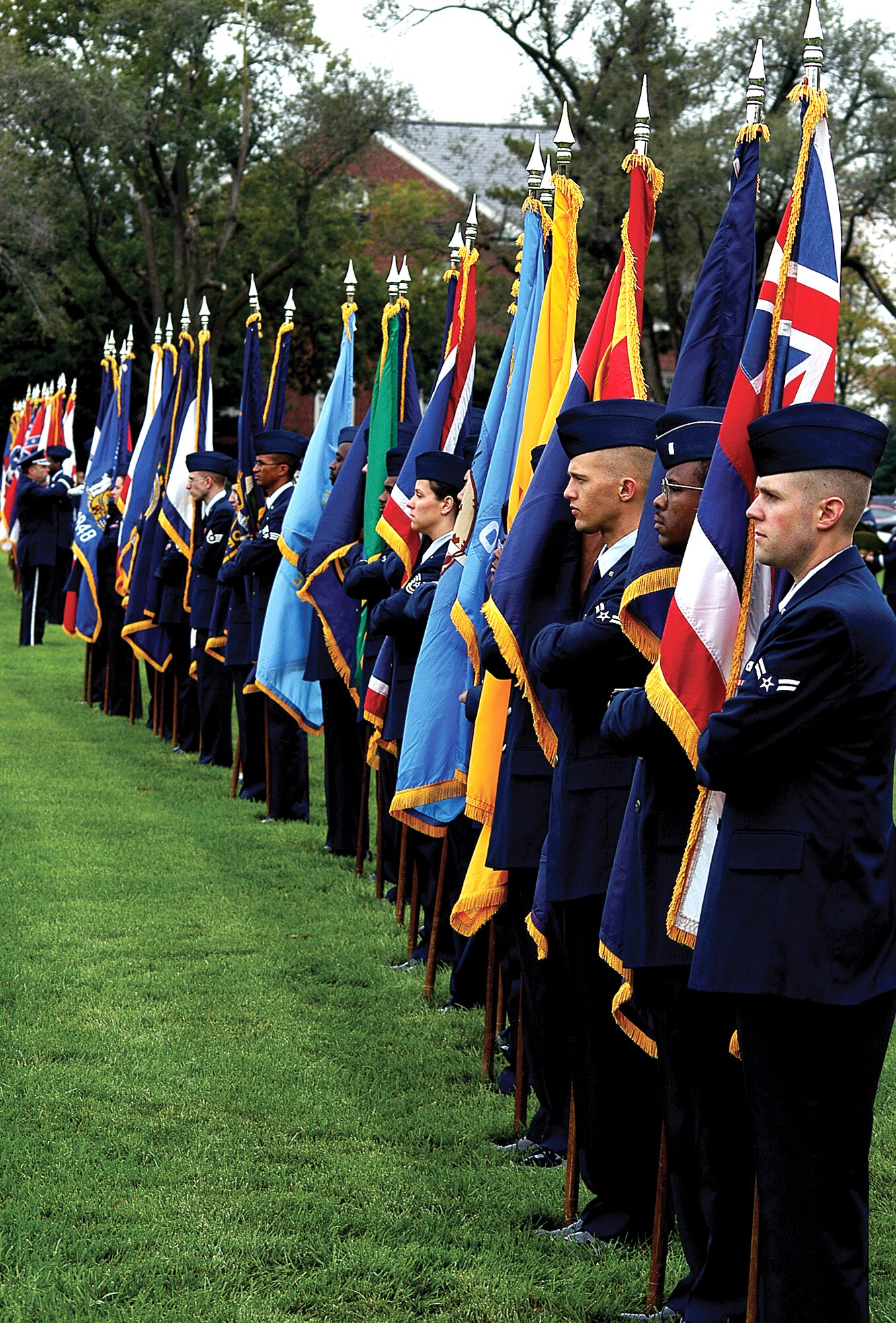 SCOTT AIR FORCE BASE, Ill. -- Airmen bear flags of the 50 states during the 18th Air Force reactivation ceremony Oct. 1 on the parade field here.  (U.S. Air Force photo by Bob Fehringer)