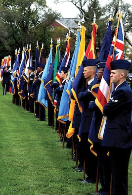 SCOTT AIR FORCE BASE, Ill. -- Airmen bear flags of the 50 states during the 18th Air Force reactivation ceremony Oct. 1 on the parade field here.  (U.S. Air Force photo by Bob Fehringer)