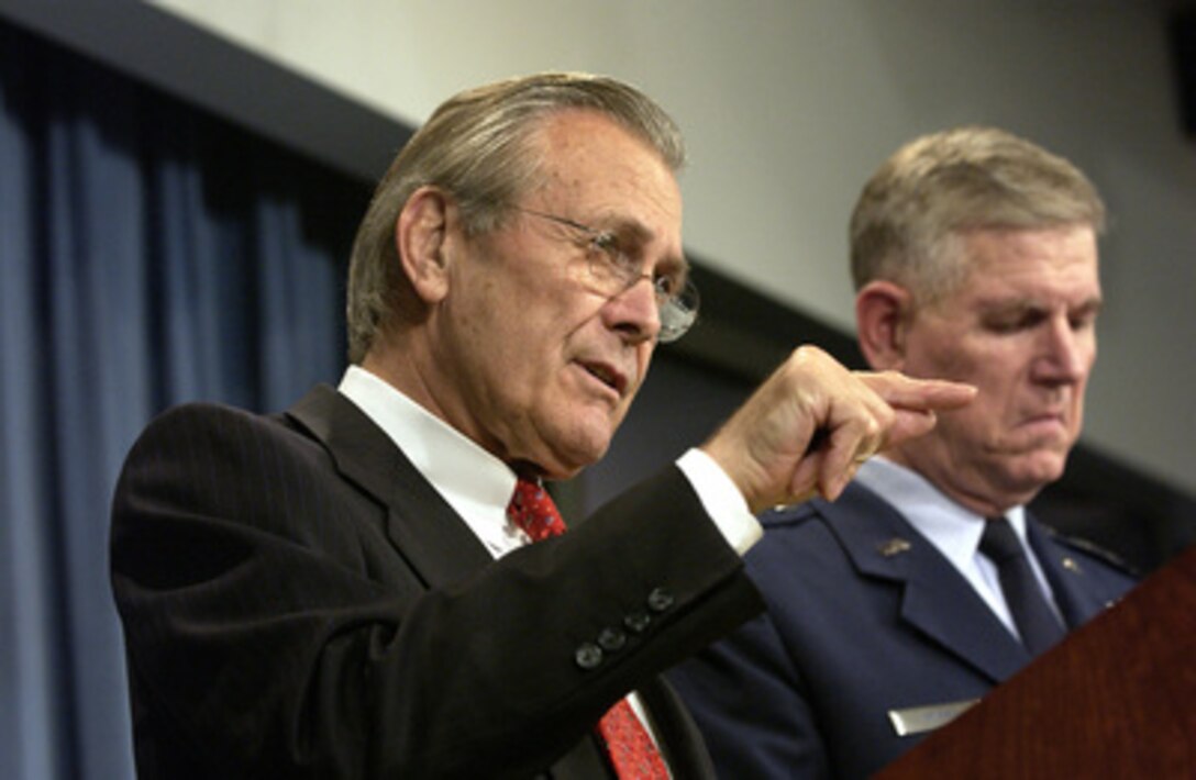 Secretary of Defense Donald H. Rumsfeld responds to a reporter's question during a Pentagon press briefing on Oct. 2, 2003. Rumsfeld and Chairman of the Joint Chiefs of Staff Gen. Richard B. Myers, U.S. Air Force, gave reporters an operational update on Operation Iraqi Freedom. 