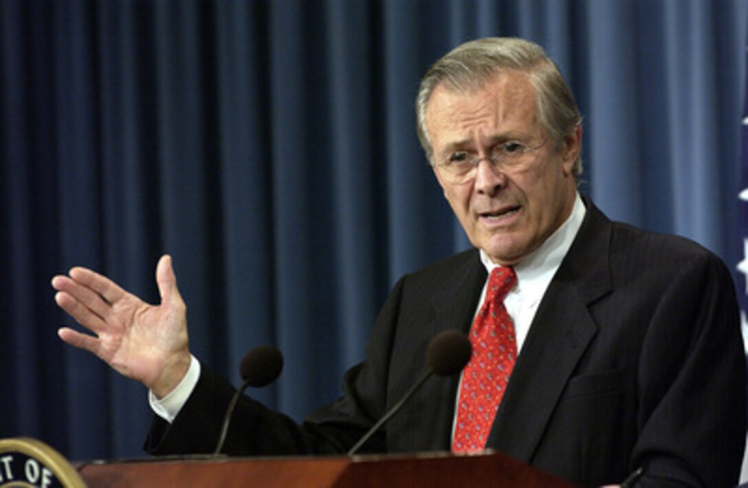 Secretary of Defense Donald H. Rumsfeld responds to a reporter's question during a Pentagon press briefing on Oct. 2, 2003. Rumsfeld and Chairman of the Joint Chiefs of Staff Gen. Richard B. Myers, U.S. Air Force, gave reporters an operational update on Operation Iraqi Freedom. 