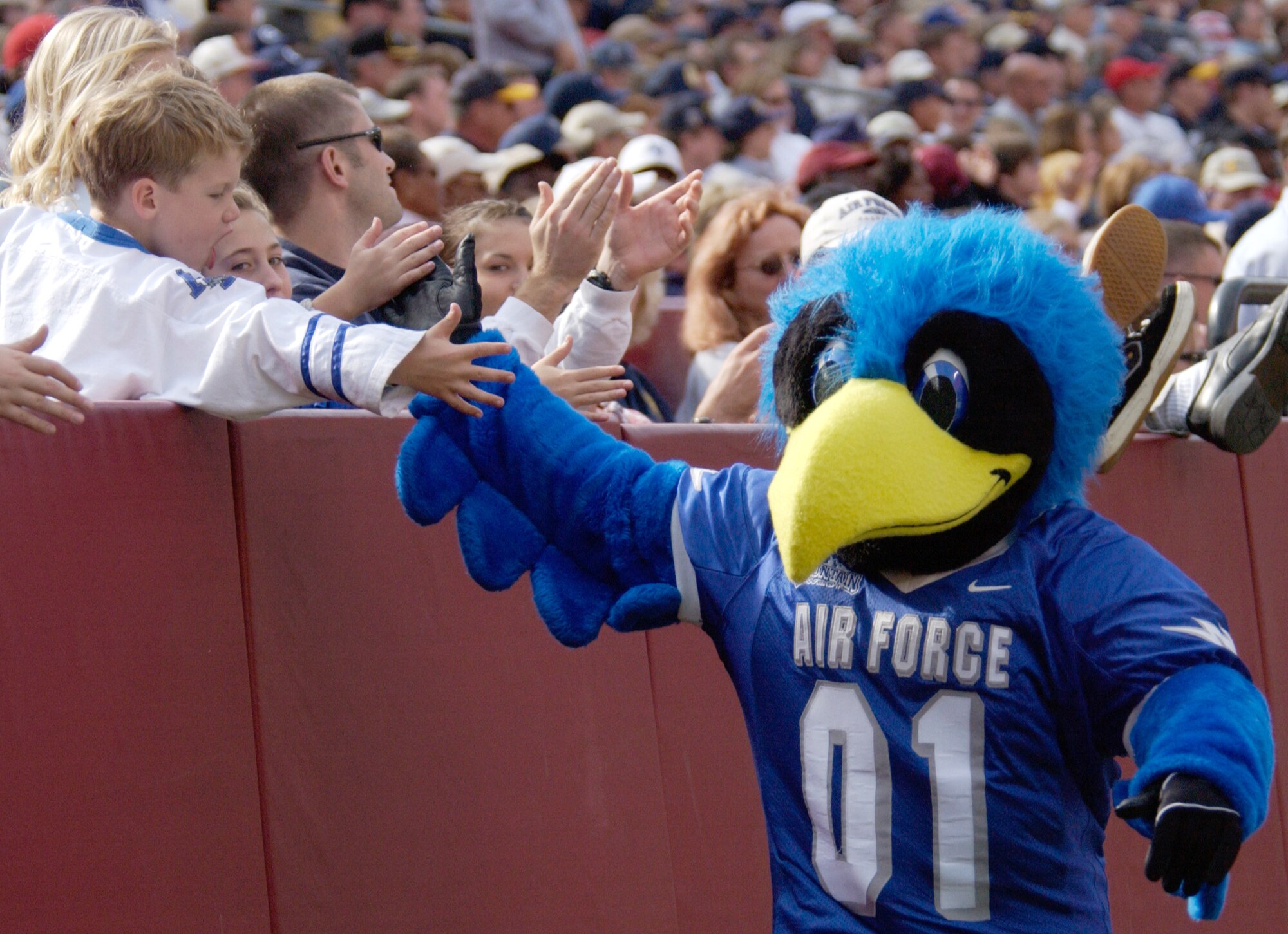 LANDOVER, Md. -- The U.S. Air Force Academy's mascot, "The Bird," greets a few of the 30,000-plus fans on hand as the Air Force Falcons take on the U.S. Naval Academy squad at FedEx Field here Oct. 4.  Despite some promising early success, the Air Force Falcon's fell to the Navy Midshipmen 28-25.  (U.S. Air Force photo by Master Sgt. Jim Varhegyi)