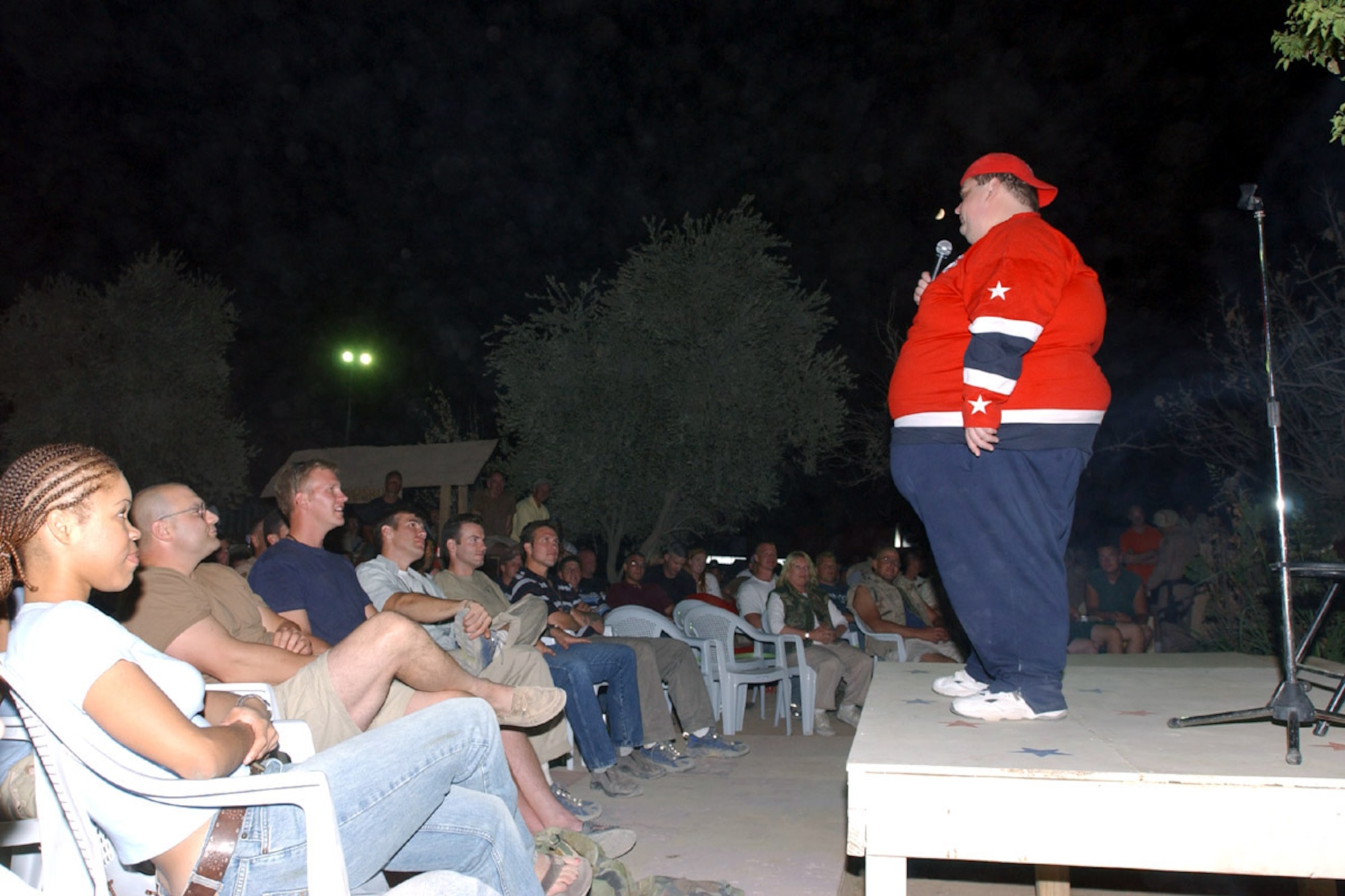 KIRKUK AIR BASE, Iraq -- Ralphie May, the headliner for the USO Laugh Factory Comedy Tour, performed for more than 300 deployed people here Oct. 2.  (U.S. Air Force photo by Tech. Sgt. Charlein Sheets)