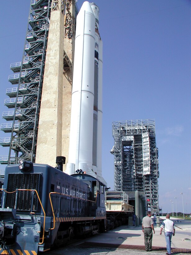 CAPE CANAVERAL AIR FORCE STATION, Fla. -- A Titan IVB rolls out from the Solid Motor Assembly and Readiness Facility to Space Launch Complex 40 in preparation for the February 2004 launch of a Defense Support Program satellite.  This will be the second to last Titan IVB to launch from here.  (U.S. Air Force photo by Master Sgt. Lou Moyer)