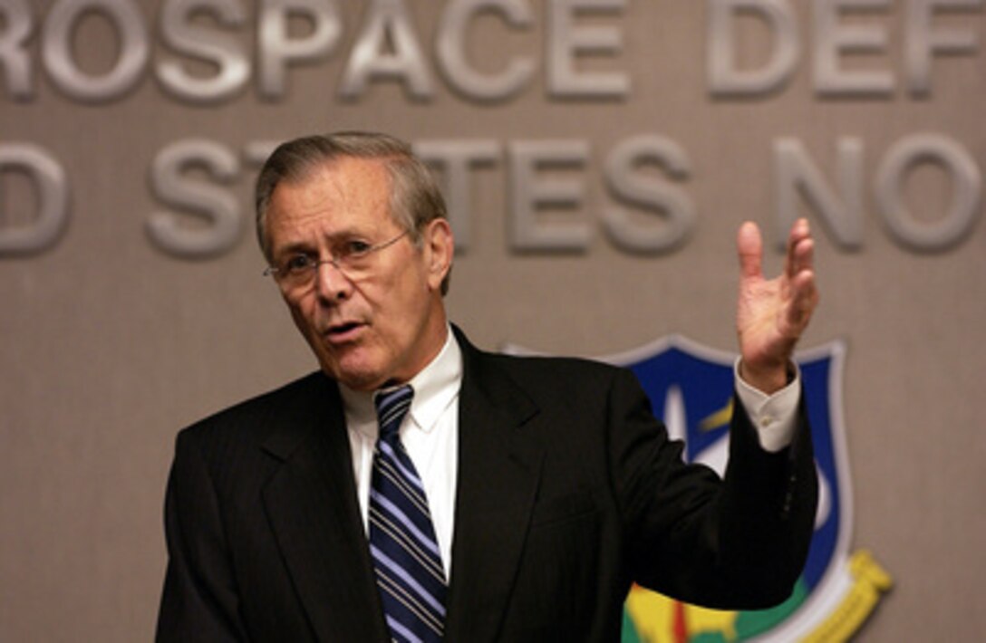 Secretary of Defense Donald H. Rumsfeld talks with the senior military and civilian leadership of the North American Aerospace Command and United States Northern Command, at Peterson Air Force Base, Colo., on Oct. 6, 2003. Rumsfeld is visiting area commands prior to hosting the 2003 NATO informal defense ministers' meeting in Colorado Springs on October 8th and 9th. 