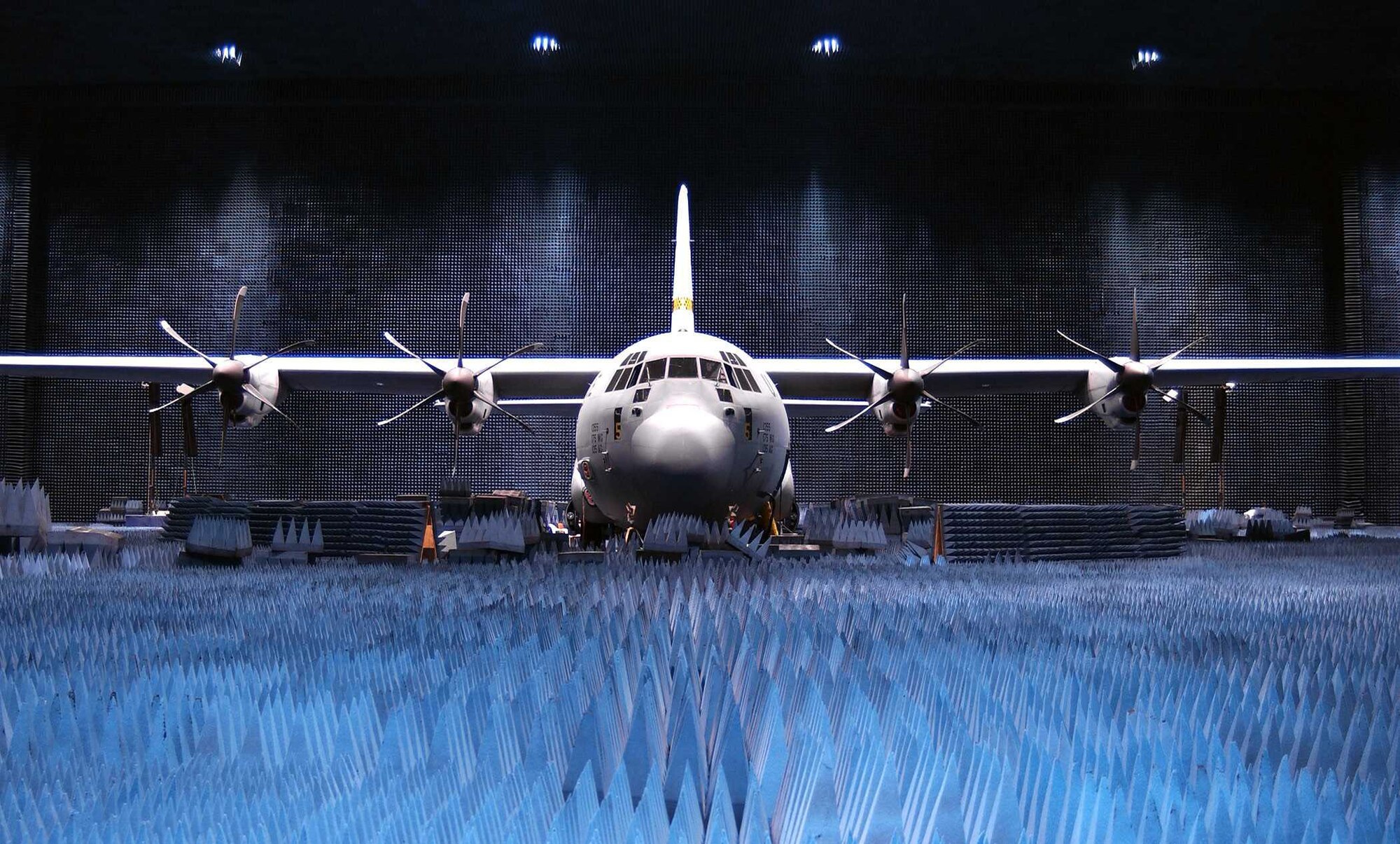 EDWARDS AIR FORCE BASE, Calif. -- A C-130J Hercules sits in the Benefield Anechoic Facility here during a defensive systems electronic warfare test.  Ground testing of the systems took place in the chamber to ensure all of the systems integrated into the mission computer would not interfere with other avionics systems before the aircraft began operational test flights.  Open-air testing of the integrated defensive systems began Oct. 7 at China Lake Naval Weapons Center.  (U.S. Air Force photo by Thomas Powell)