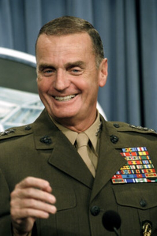 Gen. James L. Jones, U.S. Marine Corps, commander, U.S. European Command and supreme allied commander, Europe, responds to a reporter's question during a press briefing at the Pentagon on Oct. 10, 2003. Jones came to the Pentagon directly from the just completed NATO defense ministerial, held in Colorado Springs, Colo., to update reporters on NATO and European Command issues. 