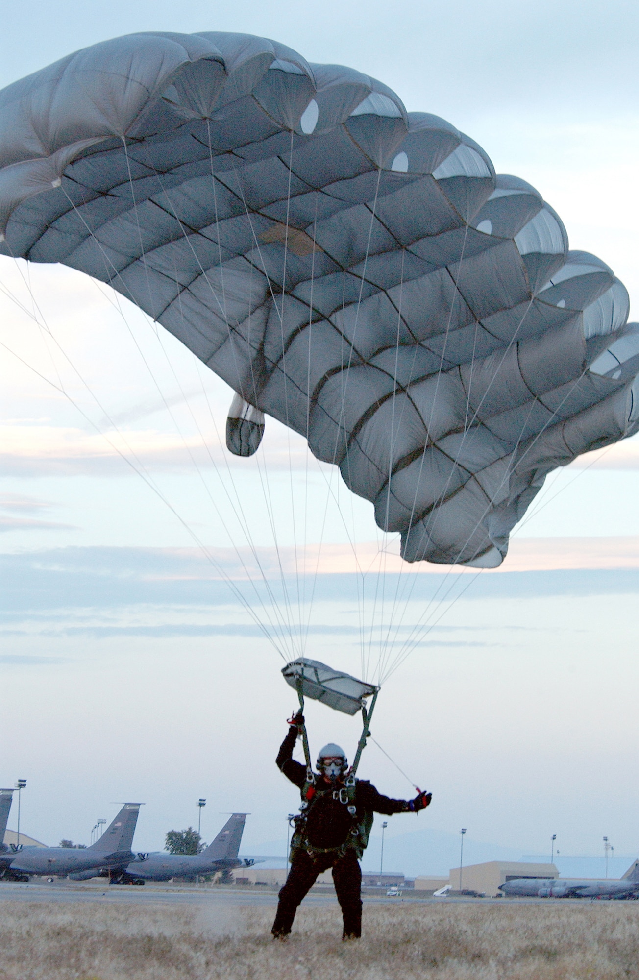 FAIRCHILD AIR FORCE BASE, Wash. -- Tech. Sgt. Steven Filby has a safe landing here after parachuting more than 25,000 feet from a C-17 Globemaster III.  Filby is the personal parachute program manager for Fairchild's 336th Training Group.  (U.S. Air Force photo by Senior Airman Lapedra Tolson)