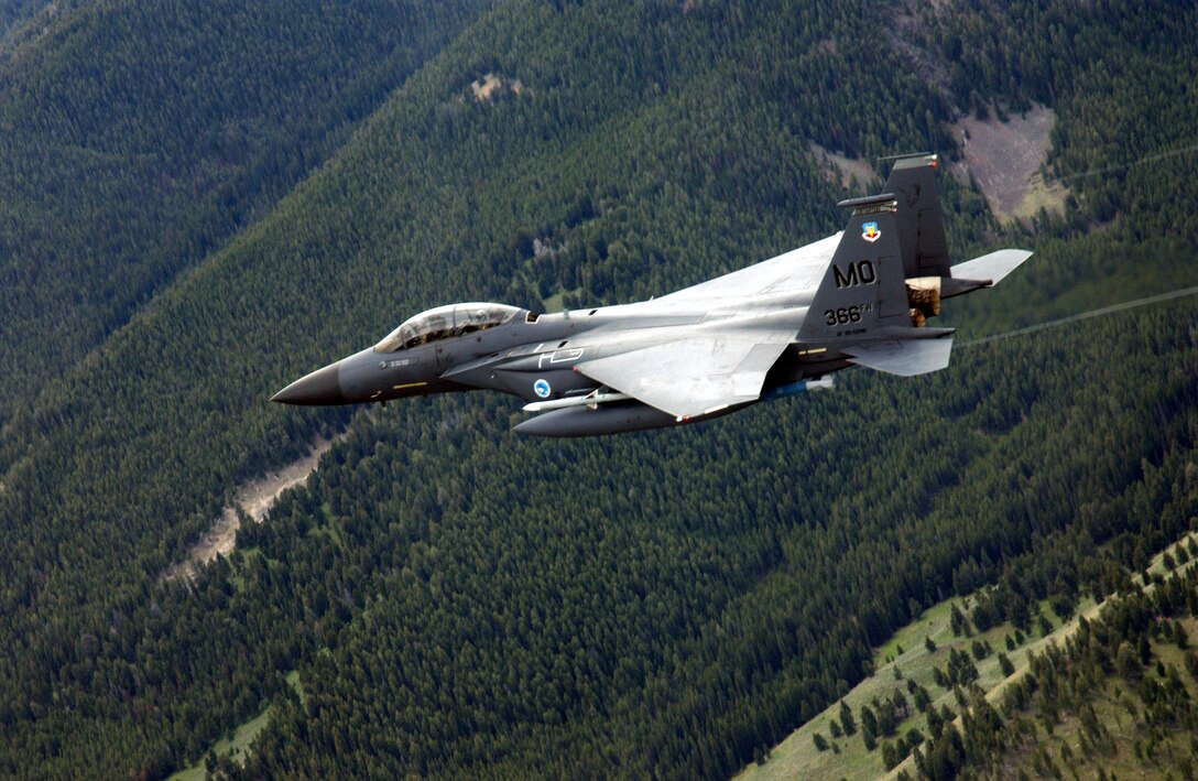 MOUNTAIN HOME AIR FORCE BASE, Idaho -- An F-15E Strike Eagle performs a low-level training mission over the Sawtooth Mountain Range. Strike Eagles based here give the 366th Fighter Wing sophisticated air-to-ground attack capabilities and air-to-air superiority.  (U.S. Air Force photo by Tech. Sgt. Debbie Hernandez)