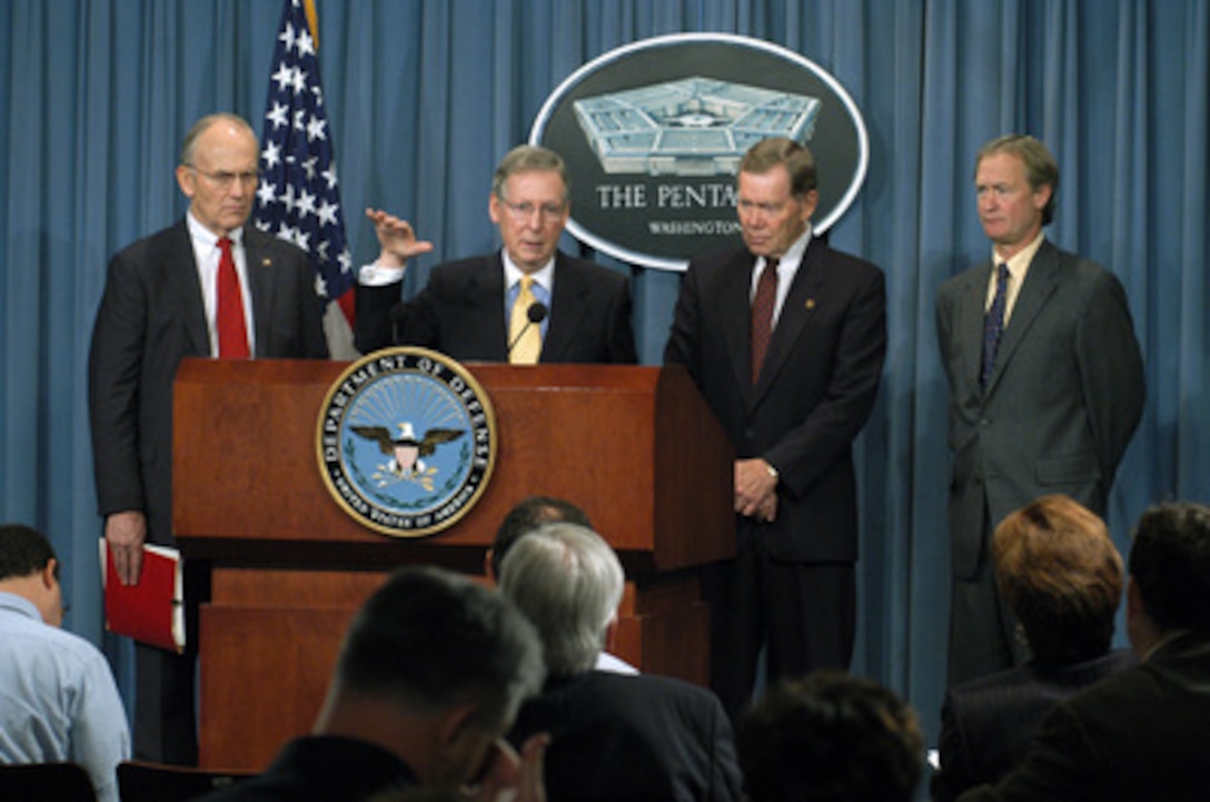 Republican Sen. Mitch McConnell (center) of Kentucky tells reporters about his recent trip to Iraq during a press briefing in the Pentagon on Oct. 16, 2003. McConnell led the congressional delegation of Republican Senators Larry Craig (left) of Idaho, Craig Thomas (2nd from right) of Wyoming, and Lincoln Chafee (right) of Rhode Island, to Iraq to talk to constituents and assess the progress of the Coalition's efforts to rebuild the nation. 