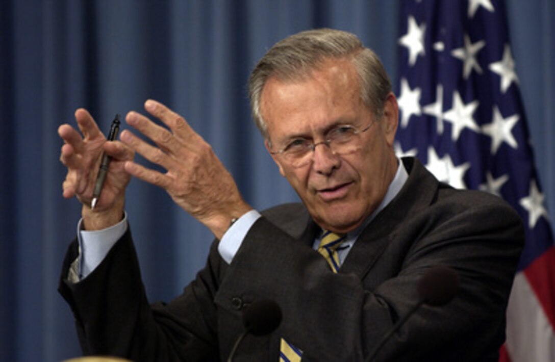 Secretary of Defense Donald H. Rumsfeld responds to a reporter's question during a Pentagon press briefing on Oct. 16, 2003. Rumsfeld and Chairman of the Joint Chiefs of Staff Gen. Richard B. Myers, U.S. Air Force, gave reporters an operational update on the coalition's progress in Iraq. 