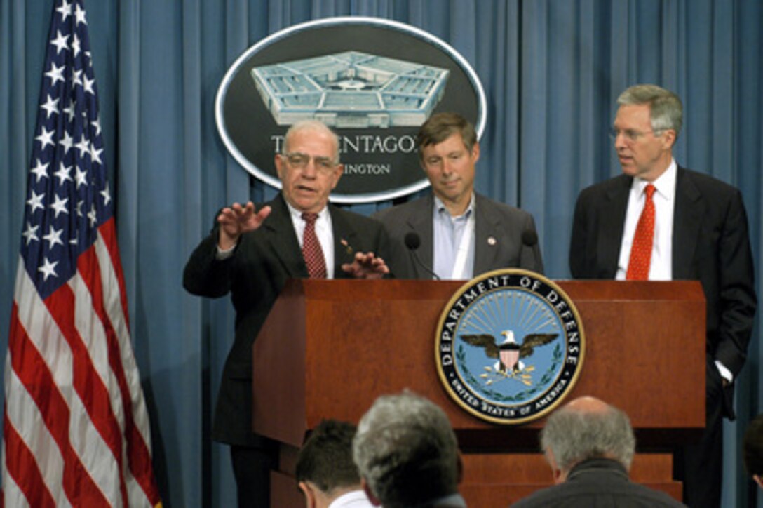 Republican Congressman Jim Saxton (left) of New Jersey tells reporters about his bi-partisan delegation's trip to Iraq during a Pentagon press briefing on Oct. 22, 2003. Saxton was joined at the briefing by Republican Congressman Fred Upton (center) of Michigan and Democratic Congressman Jim Turner of Texas. Members of the delegation met with U.S. troops deployed to Iraq, Ambassador Paul Bremer, Iraqi interim government leaders and Iraqi citizens. 