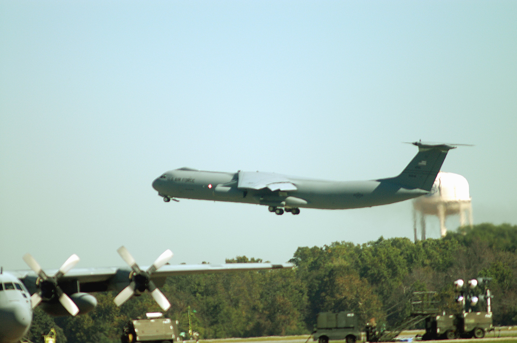 ROBINS AIR FORCE BASE, Ga. -- A C-141 Starlifter, Tail No. 65-0248, departs Oct. 16 following a ceremony to mark the end of C-141 maintenance here.  The Air Force expects to phase the aircraft out of its inventory in 2006.  (U.S. Air Force photo by Sue Sapp)