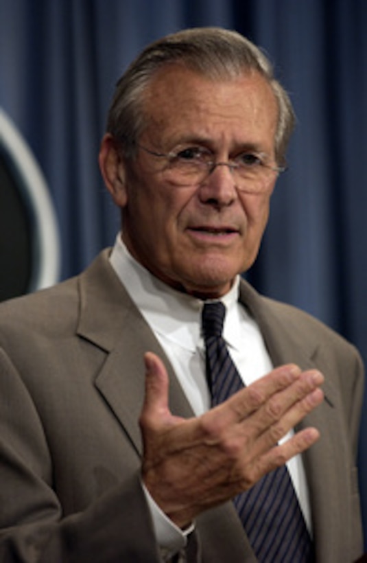 Secretary of Defense Donald H. Rumsfeld responds to a reporter's question during a Pentagon press briefing on Oct. 21, 2003. Rumsfeld and Vice Chairman of the Joint Chiefs of Staff Gen. Peter Pace, U.S. Marine Corps, briefed reporters on the progress of the coalition efforts in Iraq. 