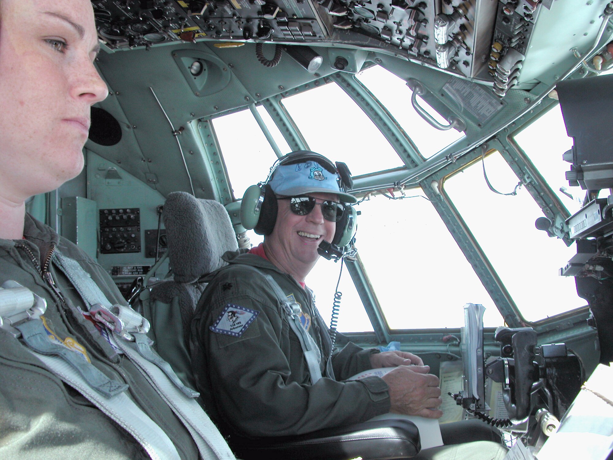 LITTLE ROCK AIR FORCE BASE, Ark. -- Lt. Col. Larry Hill, a 154th Training Squadron pilot, is all smiles as he flies a C-130 Hercules for the final time in his 34-year career Oct. 28.  The colonel and his twin daughters -- Capts. Elissa Granderson and Leslie Hill -- flew his final flight together.  Leslie was in the co-pilot seat with him for the first half of the two-hour flight.  (U.S. Air Force photo by Tech. Sgt. Bob Oldham)
