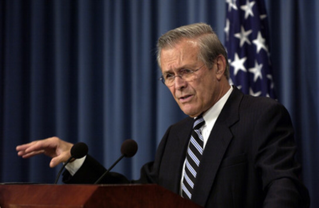 Secretary of Defense Donald H. Rumsfeld talks to reporters about the coalition's efforts in establishing and training an Iraqi police force during a Pentagon press briefing on Oct. 30, 2003. Rumsfeld also updated reporters on the coalition's progress elsewhere during Operation Iraqi Freedom. 