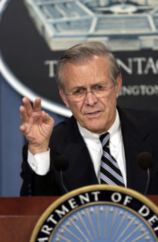 Secretary of Defense Donald H. Rumsfeld updates reporters on the progress of Operation Iraqi Freedom during a Pentagon press briefing on Oct. 30, 2003. Rumsfeld remarked on the coalition's efforts in establishing and training an Iraqi police force. 