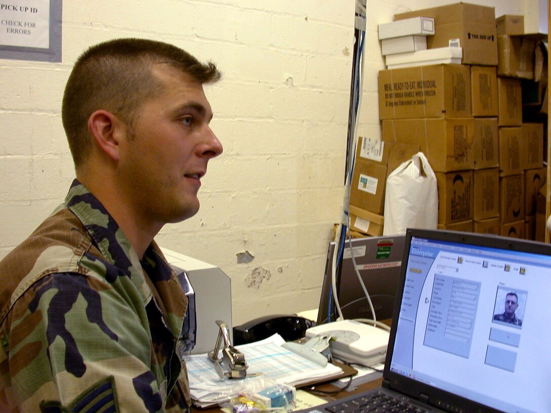 U.S. NAVAL BASE GUANTANAMO BAY, Cuba -- Staff Sgt. Todd Cook is one of a handful of airmen supporting Joint Task Force-Guantanamo.  He is responsible for in-processing all new task force people.  Cook is deployed from Wright-Patterson Air Force Base, Ohio.  (U.S. Air Force photo by Master Sgt. Tammy Cournoyer)