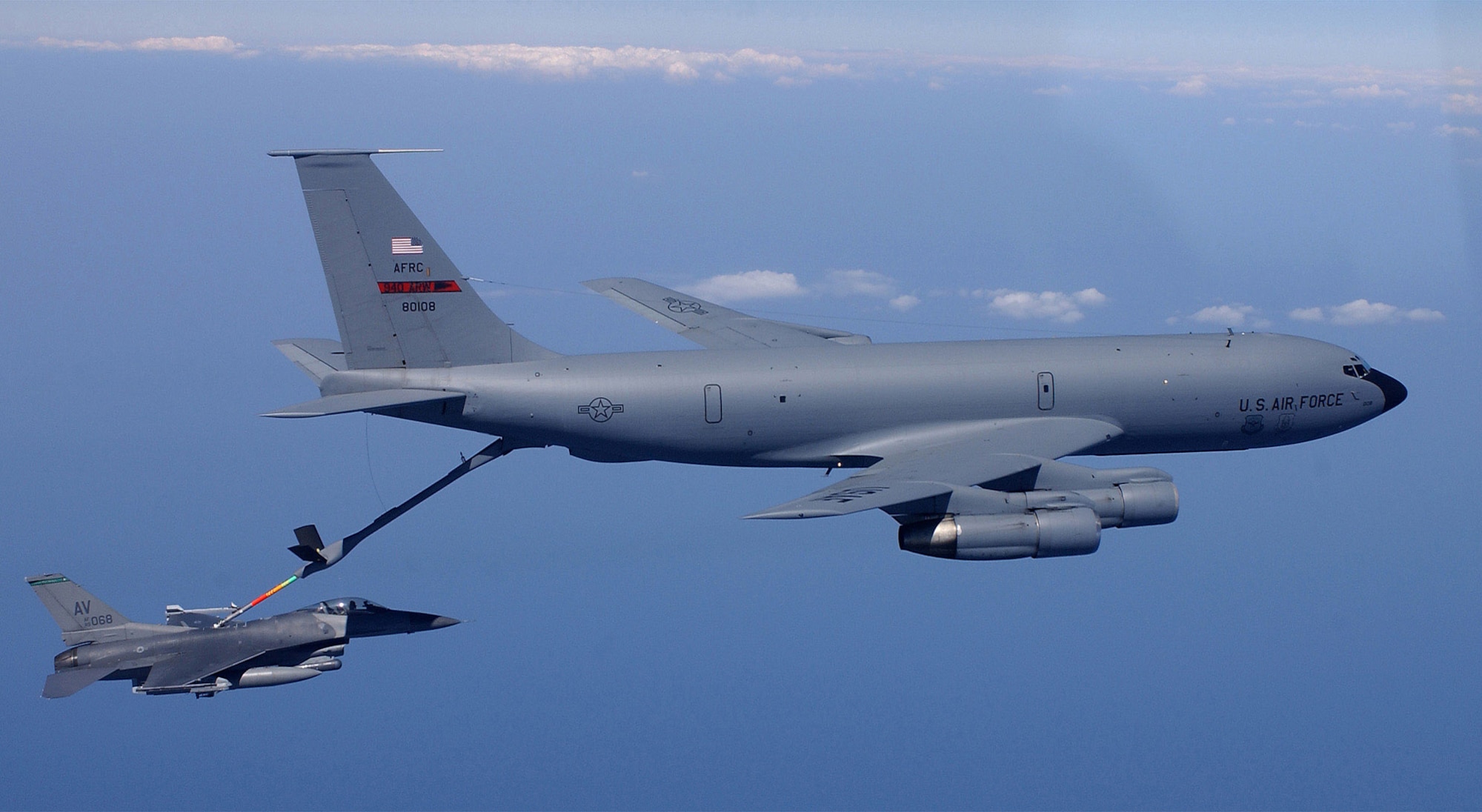 FILE PHOTO -- A KC-135 Stratotanker refuels an F-16 Fighting Falcon.  Air Force Secretary Dr. James G. Roche concluded testimony before the Senate Armed Services Committee on Sept. 4.  He answered questions about the 2004 Air Force Tanker Lease Proposal, which would replace ageing KC-135s with leased KC-767s.  (U.S. Air Force photo by Tech. Sgt. Mike Buytas)