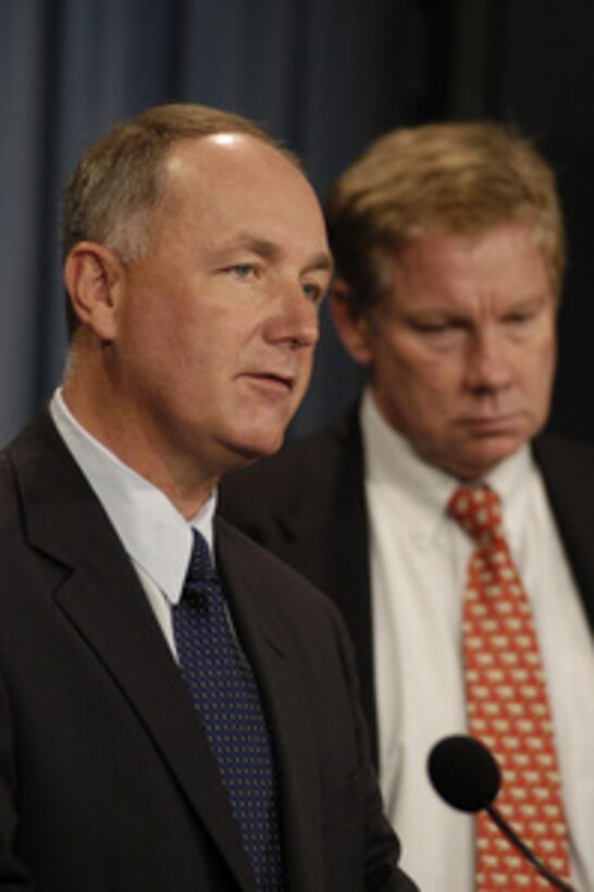 Congressman Peter Hoekstra (R-MI) accompanied by Congressman Thomas M. Davis III (R-VA) conducts a media availability at the Pentagon on Sept. 4, 2003. The congressmen recently returned from operations in Iraq. 