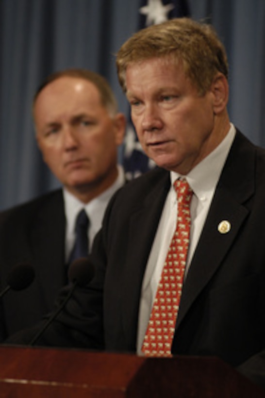 Congressman Thomas M. Davis III (R-VA) accompanied by Congressman Peter Hoekstra (R-MI) conducts a media availability at the Pentagon on Sept. 4, 2003. The congressmen recently returned from operations in Iraq. 