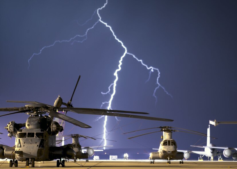 EDWARDS AIR FORCE BASE, Calif. -- Lightning strikes on the horizon behind the flightline here during a thunderstorm Sept. 3.  During the storm, power in some areas of the base was interrupted for a few minutes.  (U.S. Air Force photo by James Shryne)