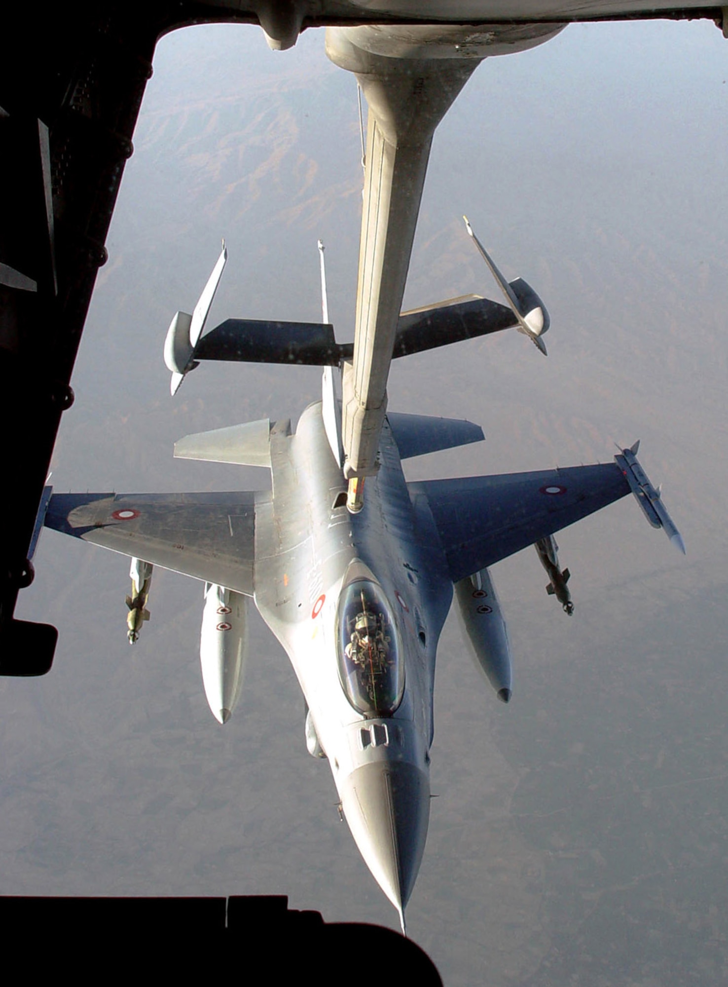 OPERATION ENDURING FREEDOM -- A KC-10 Extender from the 380th Air Expeditionary Wing refuels a Danish air force F-16 Fighting Falcon over Afghanistan.  (U.S. Air Force photo by Senior Airman Rachel Bush)