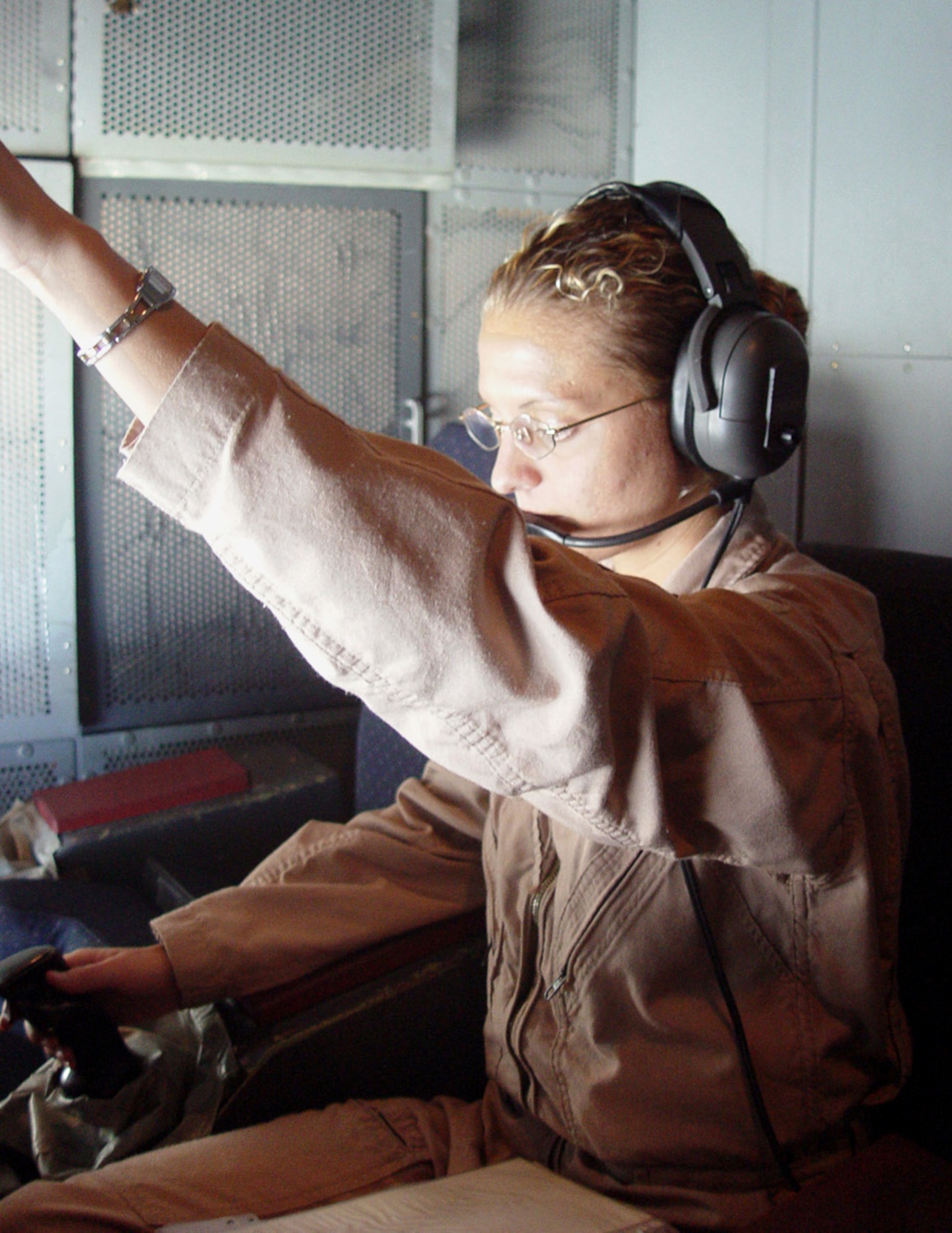 OPERATION ENDURING FREEDOM -- Airman 1st Class Katherine Monke operates the boom on a KC-10 Extender during a recent combat mission over Afghanistan.  (U.S. Air Force photo by Senior Airman Rachel Bush)