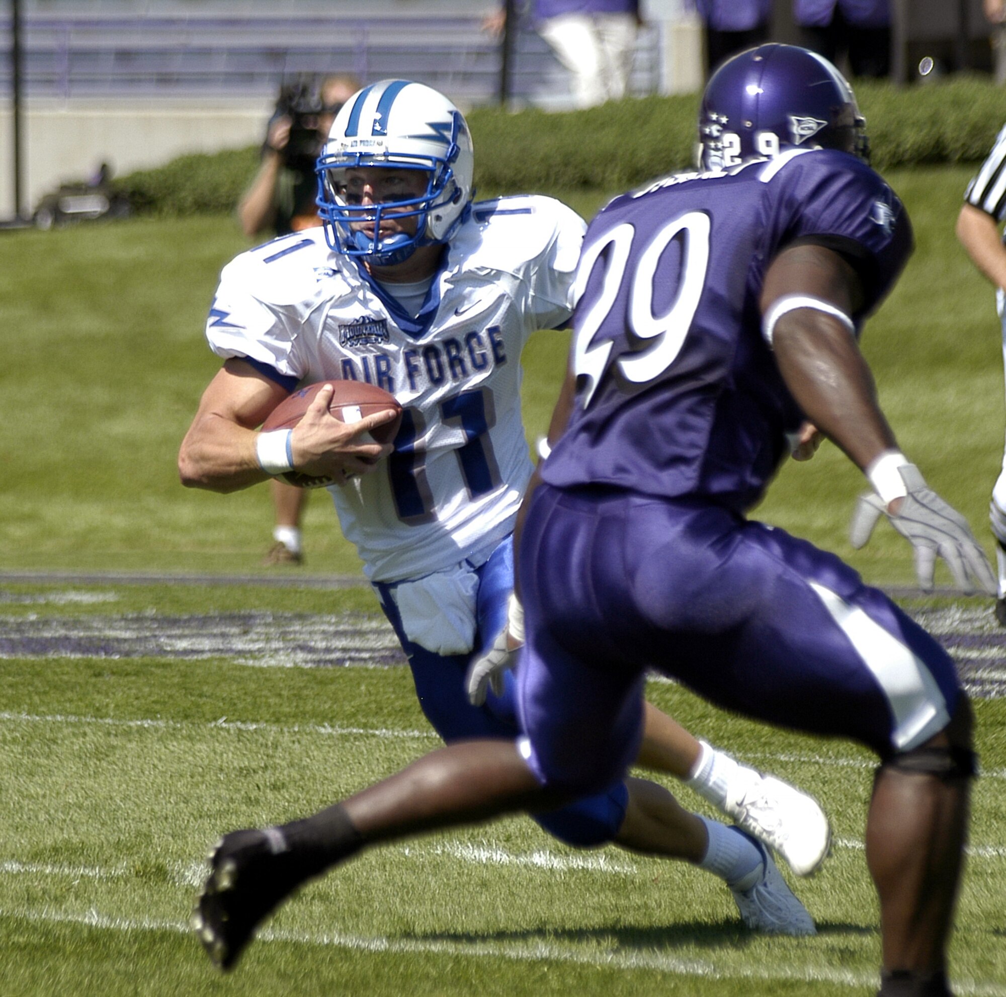 EVANSTON, Ill. -- Air Force Academy Falcon quarterback Chance Harridge cuts upfield on an option play to gain some yardage.  The academy beat Northwestern, 22-21.  (U.S. Air Force photo by 2nd Lt. Rob Arnett)