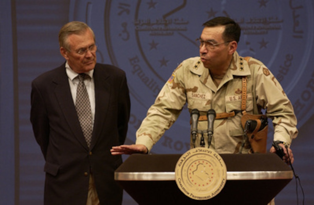 Lt. Gen. Ricardo Sanchez responds to a reporter's question during a press conference with Secretary of Defense Donald H. Rumsfeld on Sept. 6, 2003, in Baghdad, Iraq. 