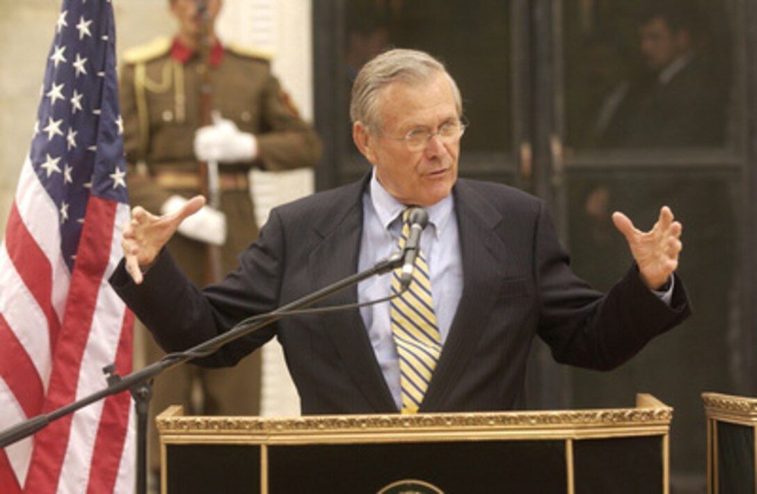 Secretary of Defense Donald H. Rumsfeld responds to a reporter's question during a joint press conference on Sept. 7, 2003, in Kabul, Afghanistan. Rumsfeld and Afghan President Hamid Karzai briefed reporters on progress in Afghanistan. 