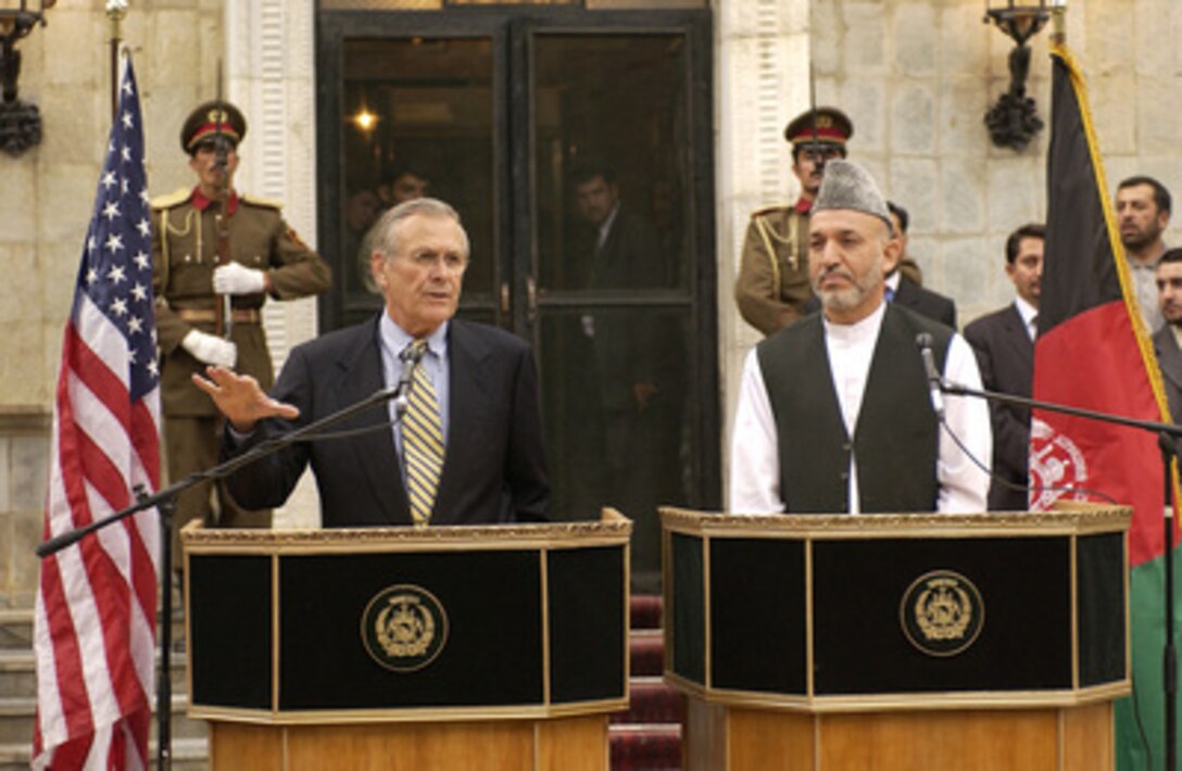 Secretary of Defense Donald H. Rumsfeld responds to a reporter's question during a joint press conference on Sept. 7, 2003, in Kabul, Afghanistan. Rumsfeld and Afghan President Hamid Karzai briefed reporters on progress in Afghanistan. 
