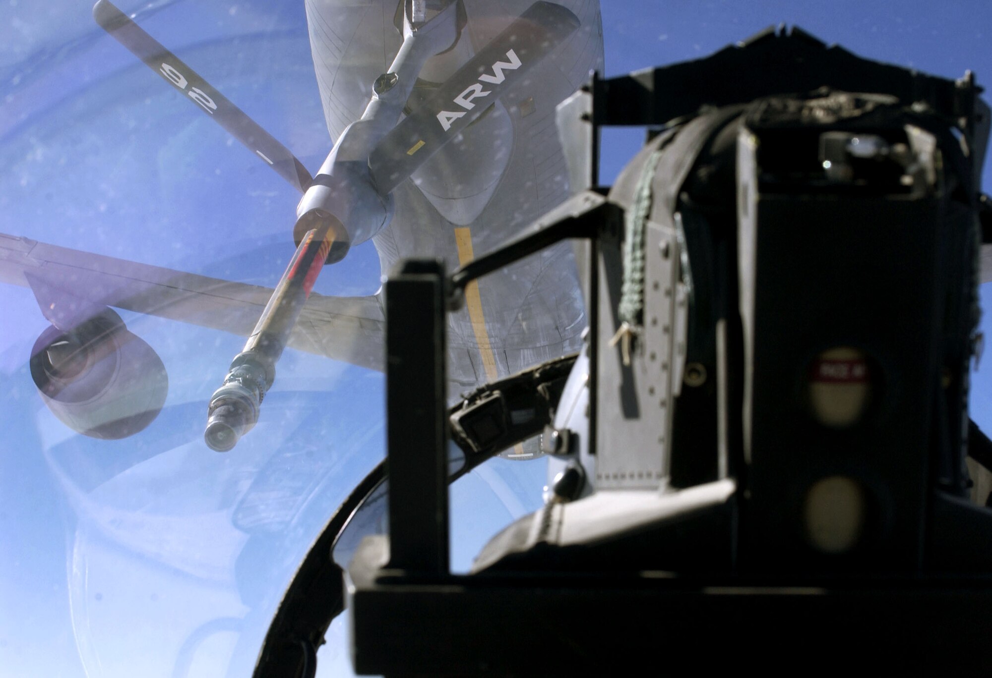 OPERATION IRAQI FREEDOM -- A KC-135 Stratotanker from the 340th Expeditionary Air Refueling Squadron prepares to refuel to an F-15E Strike Eagle over the skies of Iraq during a mission Aug. 28.  (U.S. Air Force photo by: Staff Sgt Lee A Osberry Jr.)