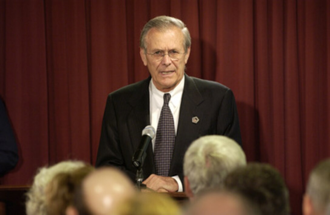 Secretary of Defense Donald H. Rumsfeld gives his remarks to the attendees at the dedication ceremony of new stained glass windows in the Pentagon Chapel on Sept. 11, 2003. The new windows are dedicated to the memory of those who died in the Pentagon on Sept. 11, 2001. 